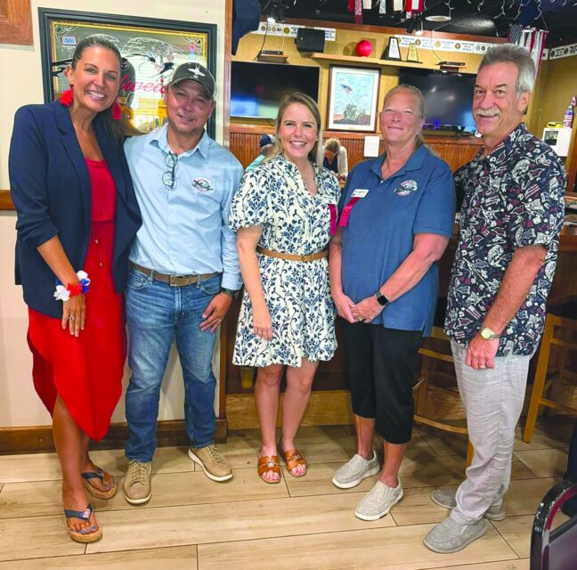 Lainey Muenich with Stuart Air Show staff and board members at the Chamber breakfast